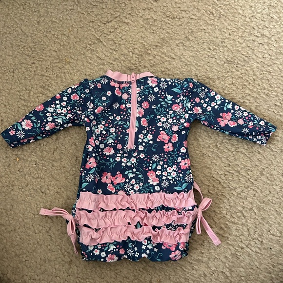 Ruffle Butts Moonlit Meadow one piece rash guard - Picture 2 of 4
